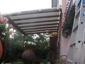 copertura scorrevole in pvc su griglia in legno RIF: SE40