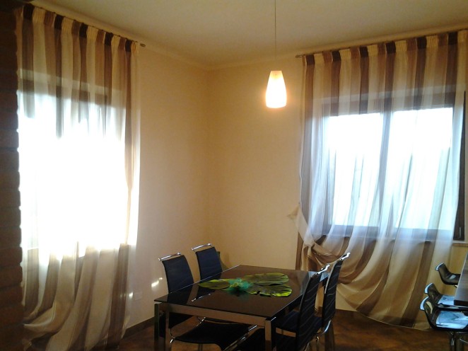 tende eleganti velate a righe verticali