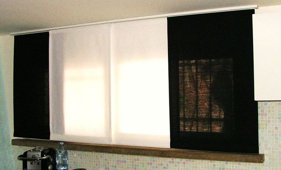 tende pannelli corti movimento a strappo